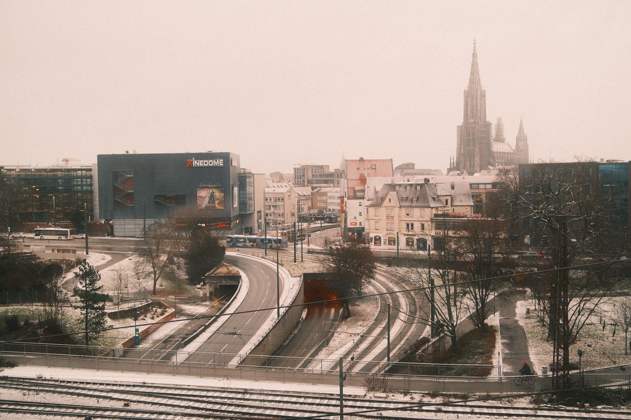 Snowy urban landscape of Ulm featuring Ulm Minster in winter.